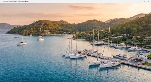 A picturesque view of Göcek bay in Turkey during golden hour, featuring calm azure waters dotted with elegant white sailboats. Lush green hills covered in pine trees frame the beautiful marina. The lighting is soft and warm, enhancing the premium, relaxing vacation atmosphere. The scene evokes a sense of tranquility and high-end lifestyle, consistent with a luxury yacht charter experience. The composition is bright, airy, and inviting.